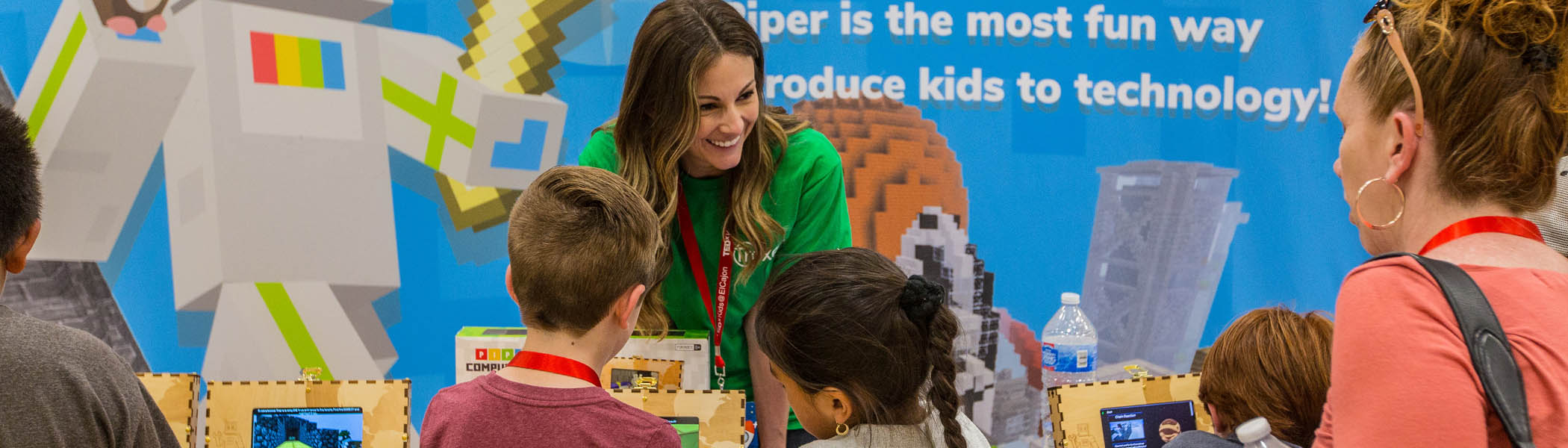 TEDxKids@ElCajon partner showing technology to students