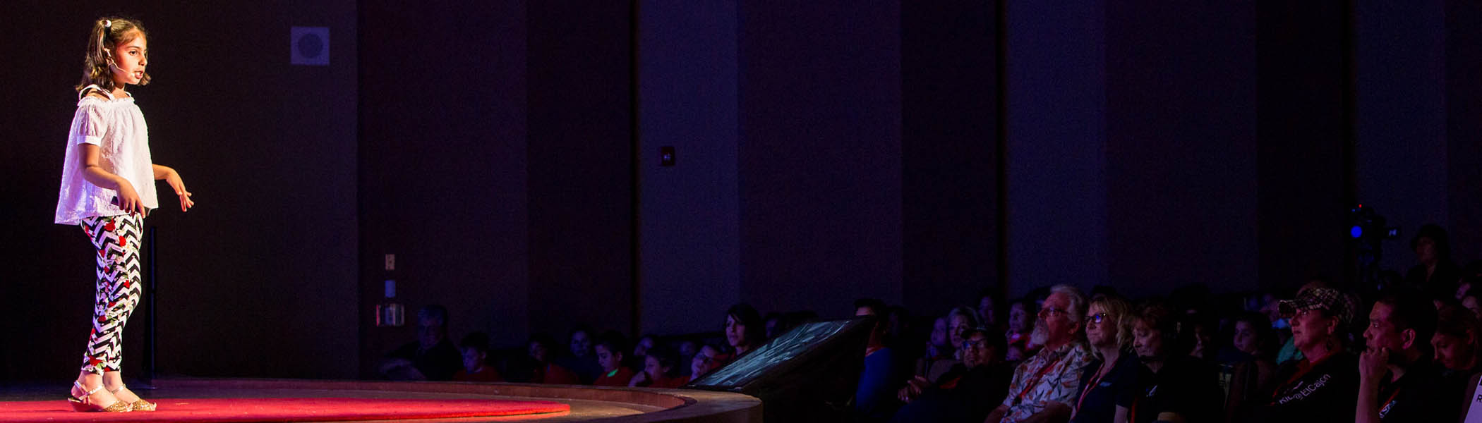 Student speaker on TEDxKids@ElCajon Stage